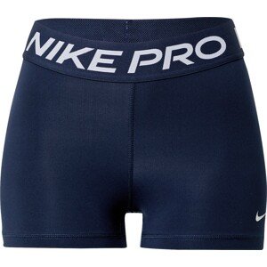 Sportovní kalhoty Nike námořnická modř / bílá