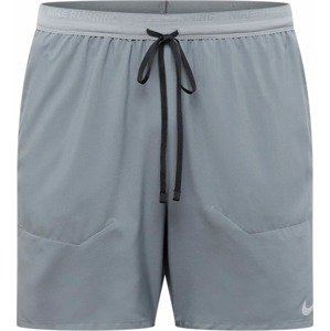 Sportovní kalhoty Nike tmavě šedá / bílá