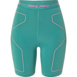 Sportovní kalhoty Nike nefritová / pink
