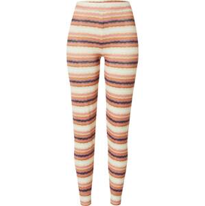 Sportovní kalhoty Billabong karamelová / fialová / černá / barva bílé vlny